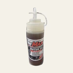 Original MiniMax 12 oz motor oil bottle on a clean background